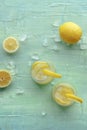 Lemonade. Lemon water drink with ice. Two glasses and fruits on blue Royalty Free Stock Photo