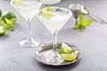 Lemonade martini cocktail garnished with lime