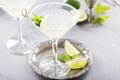 Lemonade martini cocktail garnished with lime