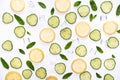 Lemonade or mohito ingredients concept on white background. Lemon slices, mint leaves , cucumber and ice cubes Royalty Free Stock Photo