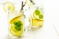 Lemonade Mojito Cocktail with Cold Fresh Ice, Lemon and Mint Leaves in Mason Jar Royalty Free Stock Photo