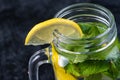 Lemonade or Mojito cocktail with lemon and mint, raspberry, sea buckthorn, grapefruit, cold refreshing drink or drink Royalty Free Stock Photo