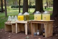 lemonade stand with a variety of flavors and sizes, from small glass bottles to large refillable pitchers