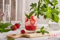 Lemonade with strawberries, ice cubes, and mint. Refreshing beverage. Royalty Free Stock Photo