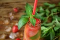 Lemonade with strawberry, lime, ice cubes and mint Royalty Free Stock Photo