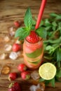 Lemonade with strawberry, lime, ice cubes and mint Royalty Free Stock Photo