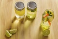 Lemonades illuminated by sunlight on wooden table