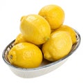Lemons in a dish isolated on white background Royalty Free Stock Photo