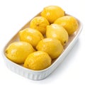 Lemons in a dish isolated on white background Royalty Free Stock Photo
