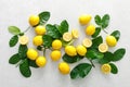 Lemons. Fresh juicy lemons with leaves on white background