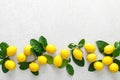 Lemons. Fresh juicy lemons with leaves on white background