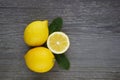 Lemons on grey wooden table.