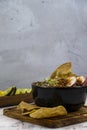 lemons for meat dish in its juice with corn tortilla chips, glass with horchata water, mexican food Royalty Free Stock Photo