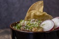 lemons for meat dish in its juice with corn tortilla chips, glass with horchata water, mexican food