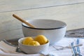 Three Lemons and Mixing Bowl Royalty Free Stock Photo