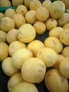 Lemons are neatly arranged in the fruit market