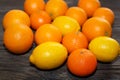 Lemons and oranges on brown wooden table Royalty Free Stock Photo