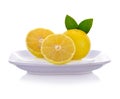 Lemons  on plate isolated on white background Royalty Free Stock Photo