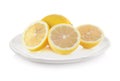 Lemons on plate isolated on white background Royalty Free Stock Photo
