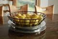 Lemons in a Wire Basket Royalty Free Stock Photo