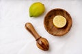 Lemons with wooden Juicer Royalty Free Stock Photo