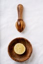 Lemons with wooden Juicer Royalty Free Stock Photo