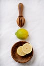 Lemons with wooden Juicer Royalty Free Stock Photo
