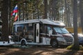 Leningrad Region, Russia - June 2022. Stylish fiat Ducato motorhome with beautiful lion pattern. Camping for campers in