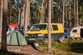 Leningrad Region, Russia - June 2022. Stylish yellow and black Volkswagen transporter T4 - house on wheels from minivan