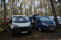 Leningrad Region, Russia - June 2022. Two Fiat ducato with large one standing next to each other at campsite. Funny eyes