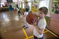 Lesson of physical education of children of elementary grades in Royalty Free Stock Photo