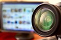 Lens of dslr camera and monitor Royalty Free Stock Photo