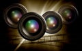 Lens & film strip on abstract dark background Royalty Free Stock Photo