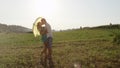 LENS FLARE: Beautiful boyfriend and girlfriend kiss after they dance in the rain Royalty Free Stock Photo