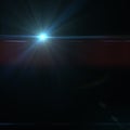 Lens flare effect over black background Royalty Free Stock Photo