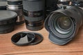 Lenses of DSLR digital camera, filters and other equipment. Royalty Free Stock Photo