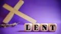 Lent Season,Holy Week and Good Friday concepts - word lent on wooden blocks in purple vintage background