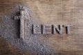 Lent word written in ash, dust as fast and abstinence period concept. Top view