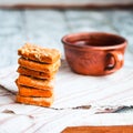 Lenten cookies on the basis of tomato juice, seeds,rustic wood b