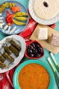 Lenten meal with fasolada,olives,vine leaves stuffed with rice,homemade taramasalata, sunflower halva, relish and fresh green Royalty Free Stock Photo