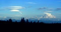 Lenticular cloud forming downwind of Mt. Rainier