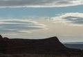 Lenticular clouds above a mesa Royalty Free Stock Photo