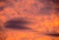 Lenticular clouds forming at sunset Royalty Free Stock Photo