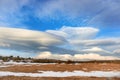 Lenticular clouds in the mountains Royalty Free Stock Photo