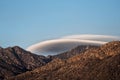 Lenticular clouds over mountain