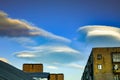 Lenticular clouds are rather rare natural phenomenon. Such clouds are formed on the crests of air waves or between two layers of