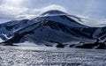 Lenticular lens-shaped clouds above Avacha volcano, Kamchatka Peninsula, Russia