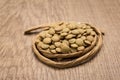 Lentil legume. Paper rope around grain. Selective focus.