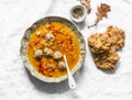 Lentil meatballs thick rich soup and corn flour cheese scones on a light background, top view. Winter comfort food Royalty Free Stock Photo