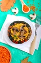 Lentil porridge with mushrooms in a pumpkin pot. Dietary, lean menu. Vegetarian dish Royalty Free Stock Photo